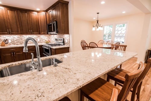 layered recessed and chandelier lighting